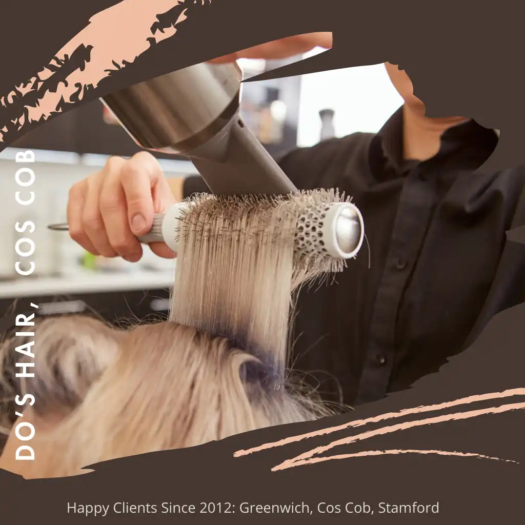 A stylist blow dries a client's hair at Do's Hair salon. A close-up shot shows the stylist's hands using a round brush and a blow dryer on a section of blonde hair. The text reads "Do's Hair, Cos Cob" and "Happy Clients Since 2012: Greenwich, Cos Cob, Stamford.